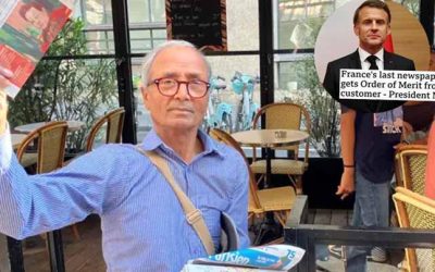 ফ্রান্সে পত্রিকার ‘সর্বশেষ’ হকার আলী আকবরকে সম্মাননা দিচ্ছেন ম্যাক্রোঁ
